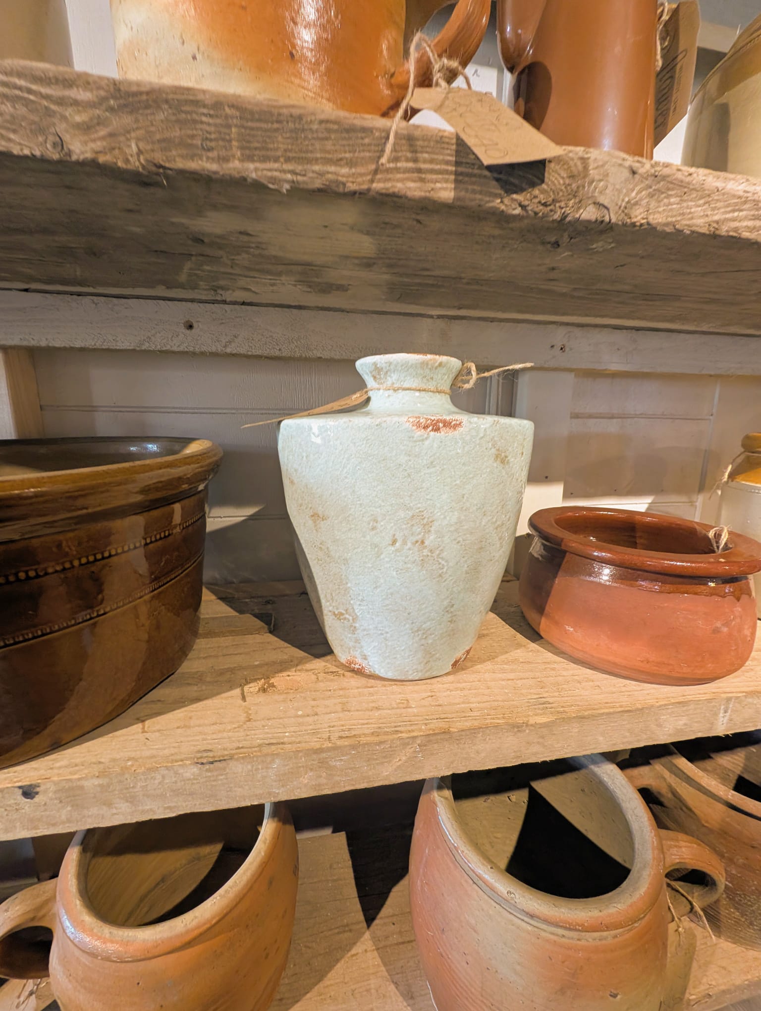 Vintage stoneware pots on a rustic shelf — Marsfield Studio